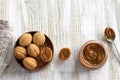 Traditional Russian  shortbread nuts with boiled condensed milk, sprinkled with powdered sugar in a wooden bowl on a wooden Royalty Free Stock Photo