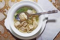 Traditional Russian Siberian pelmeni in soup