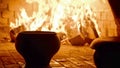 Traditional Russian stove with cooking food on wood in crock