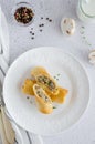 Traditional Russian thin pancakes or crepes stuffed with mushrooms with onion, garlic, herbs, cheese and cream Royalty Free Stock Photo