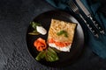 Traditional Russian thin pancakes with filling, red fish and cream cheese, top view Royalty Free Stock Photo