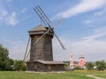 Traditional russian view. Wooden windmill and church. Suzdal, Russia Royalty Free Stock Photo