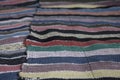 Traditional rustic very long striped rug for the bench
