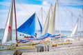 Traditional Sailboats on Crowded Boracay white beach