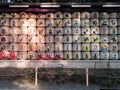 Traditional sake barrels wrapped in straw at Meiji Shrine in Shibuya, Tokyo, Japan. Royalty Free Stock Photo