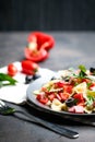 Traditional salad with pasta farfalle, ham, pepper and herbs Royalty Free Stock Photo