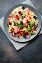 Traditional salad with pasta farfalle, ham, pepper and herbs Royalty Free Stock Photo