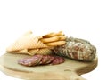 Traditional salami with bread-sticks Royalty Free Stock Photo