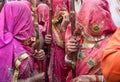 Traditional sari dress in India with beautiful colors during the Lathmar Holi Festival Royalty Free Stock Photo