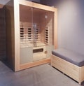 Interior view of a traditional sauna with some equipment