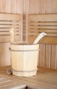 Traditional sauna for relaxation with bucket of water Royalty Free Stock Photo