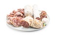 Traditional sausage with white mold. Dried sliced pork salami isolated on white background