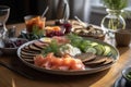A traditional, Scandinavian breakfast spread, with an array of smoked salmon, pickled herring, crispbreads, and sliced cucumbers, Royalty Free Stock Photo
