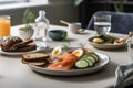 A traditional, Scandinavian breakfast spread, with an array of smoked salmon, pickled herring, crispbreads, and sliced cucumbers, Royalty Free Stock Photo