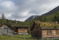 Traditional Scandinavian wooden cabins sod or turf roof house at a campsite in the Reinheim national Park. View from