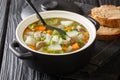 Traditional Scottish recipe: Hairst Bree Hotch Potch soup close-up in a pot. Horizontal Royalty Free Stock Photo