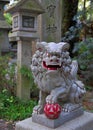 Traditional sculpture of a lion at the gate of a japanese temple Royalty Free Stock Photo