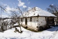 Traditional Serbian farm house in winter Royalty Free Stock Photo