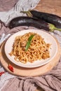 Traditional Sicilian pasta dish of sauteed eggplant topped with tomato sauce Royalty Free Stock Photo