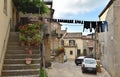 Traditional Sicilian street with laundry hung out to dry among old houses in Mistretta, Italy, Europe