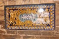 Traditional sign on azulejos, Sevilla. Tobacco factory.