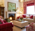 Traditional sitting room decor, interior design, red pink living room furniture, sofa and home decor in English country Royalty Free Stock Photo