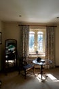 Traditional sitting room: writing desk and chair in a sunny window