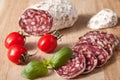 Traditional sliced salami on wooden board Royalty Free Stock Photo