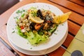 Traditional slovenian cuisine, seafood salad with fresh mussels, selective focus Royalty Free Stock Photo