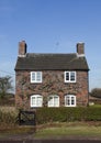 Traditional small English cottage Royalty Free Stock Photo