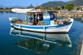 Greek Fishing Caique in Town Harbour, Greece Royalty Free Stock Photo