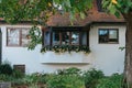 Traditional small house with beautiful outdoor decor facade in Germany. German old brick building house ancient European