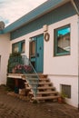 Traditional Small House With Beautiful Outdoor Decor Facade In Germany. German Old Brick Building House Ancient European