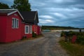 a traditional small,red,danish framehouse in summer in Bornholm with blue sky Royalty Free Stock Photo