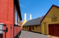 a traditional small,red,danish framehouse in summer in Bornholm with blue sky Royalty Free Stock Photo