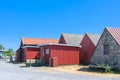 a traditional small,red,danish framehouse in summer in Bornholm with blue sky Royalty Free Stock Photo