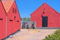 a traditional small,red,danish framehouse in summer in Bornholm with blue sky Royalty Free Stock Photo