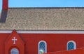 a traditional small,red,danish framehouse in summer in Bornholm with blue sky Royalty Free Stock Photo