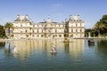 Traditional small wooden sailing boat in the pond of park Jardin du Luxembourg, Paris, France Royalty Free Stock Photo