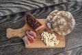 Snack with delicious South Tyrolean smoked bacon and cheese with flat bread lying on a rustic table Royalty Free Stock Photo
