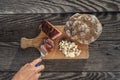 Snack with delicious South Tyrolean smoked bacon and cheese with flat bread lying on a rustic table Royalty Free Stock Photo