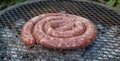Traditional South African Boerewors Sausage Grilled On A Fire