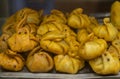 Traditional south asian sweet displayed in local shop for sell in a glass container