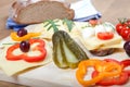 Traditional south german light meal on wooden board, german bread with cheese and vegetables Royalty Free Stock Photo