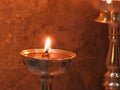 Traditional south indian brass oil lamp or Nilavilakku. During events like housewarming marriage etc. the Nilavilakku is lighted