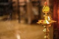 Traditional south indian brass oil lamp `Nilavilakku `. During events like housewarming, This picture is taken during a festival Royalty Free Stock Photo