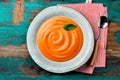 Traditional spanish andalusian tomato cream soup - salmorejo. Salmorejo or gazpacho cream soup on gray bowl, wooden Royalty Free Stock Photo