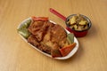 Traditional Spanish cachopo recipe with fried peppers and roasted potatoes
