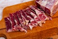 Traditional Spanish delicacy lacon curado - jerky pork ham Royalty Free Stock Photo