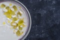 Traditional Spanish dish, cold soup ajo blanco or ajoblanco from garlic, almonds, white wine vinegar, olive oil and grapes Royalty Free Stock Photo